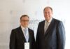 Marcel Riwalsky und der damalige Kanzleramtsminister Helge Braun beim Wirtschaftsgipfel Deutschland 2019